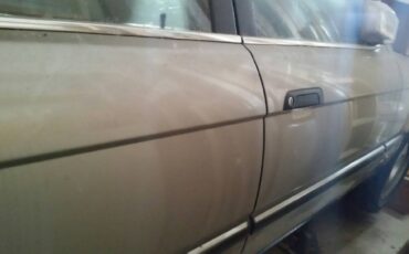 Bmw-735i-1990-brown-14