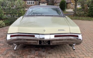 Buick-Riviera-1968-Gold-Black-13