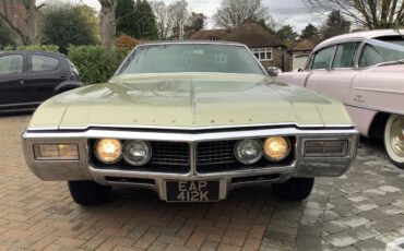 Buick-Riviera-1968-Gold-Black-5