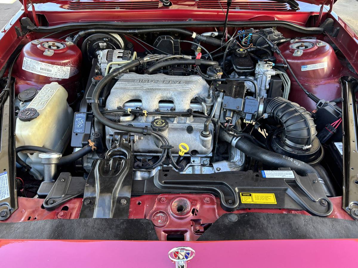 Buick-century-wagon-1996-red-20