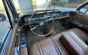 Caddillac-coupe-deville-convertible-1962-silver-1