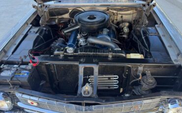 Caddillac-coupe-deville-convertible-1962-silver-13