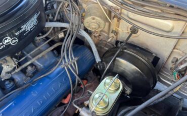 Caddillac-coupe-deville-convertible-1962-silver-2