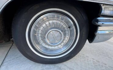 Caddillac-coupe-deville-convertible-1962-silver-3