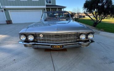 Caddillac-coupe-deville-convertible-1962-silver
