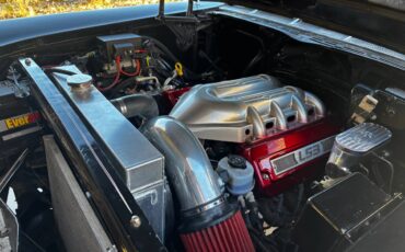 Cadillac-coupe-de-ville-1957-black-8