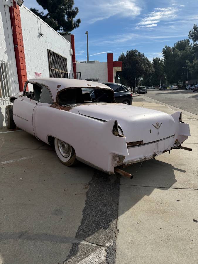 Cadillac-coupe-deville-1954-1