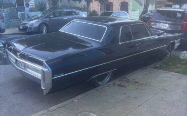 Cadillac-coupe-deville-1965-black-4