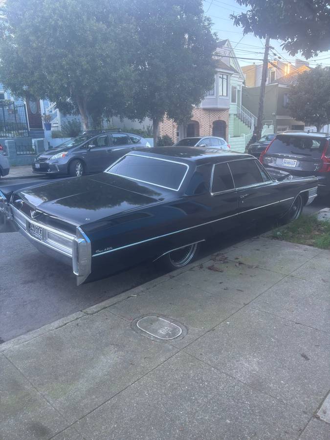 Cadillac-coupe-deville-1965-black-4