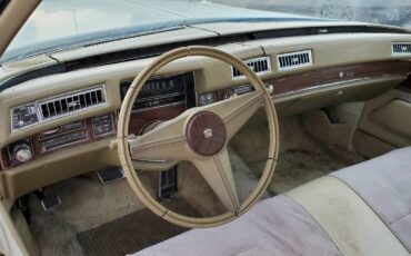 Cadillac-coupe-deville-1976-12