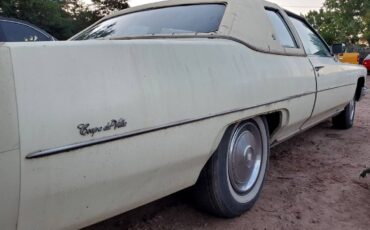 Cadillac-coupe-deville-1976-9