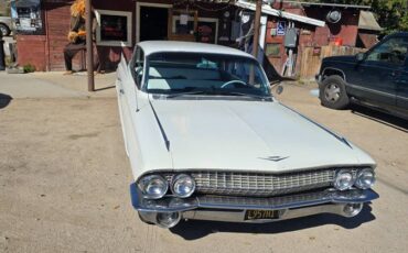 Cadillac-deville-1961-white-1