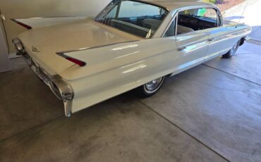 Cadillac-deville-1961-white