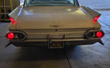 Cadillac-deville-1961-white-8