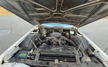 Cadillac-fleetwood-1976-white-18