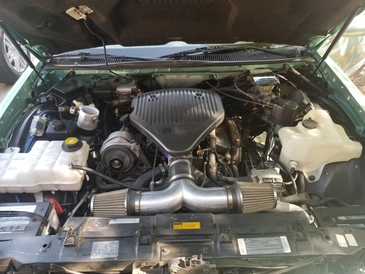 Cadillac-fleetwood-brougham-1995-custom-14