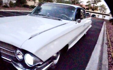 Cadillac-sedan-deville-1962-white-14