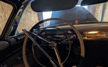 Cadillac-series-62-convertible-1957-blue-3