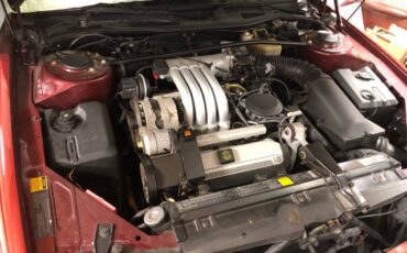 Cadillac.-allante-1989-red-7