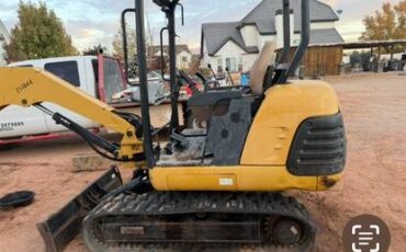 Cat-mni-excavator-diesel-1990-yellow-1