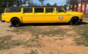 Checker-aero-bus-checker-convoy-1967-yellow-1