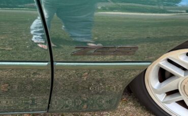 Chevrolet-camaro-z28-1996-green-5