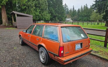 Chevy-cavalier-1985-orange-1
