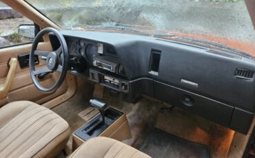 Chevy-cavalier-1985-orange-13