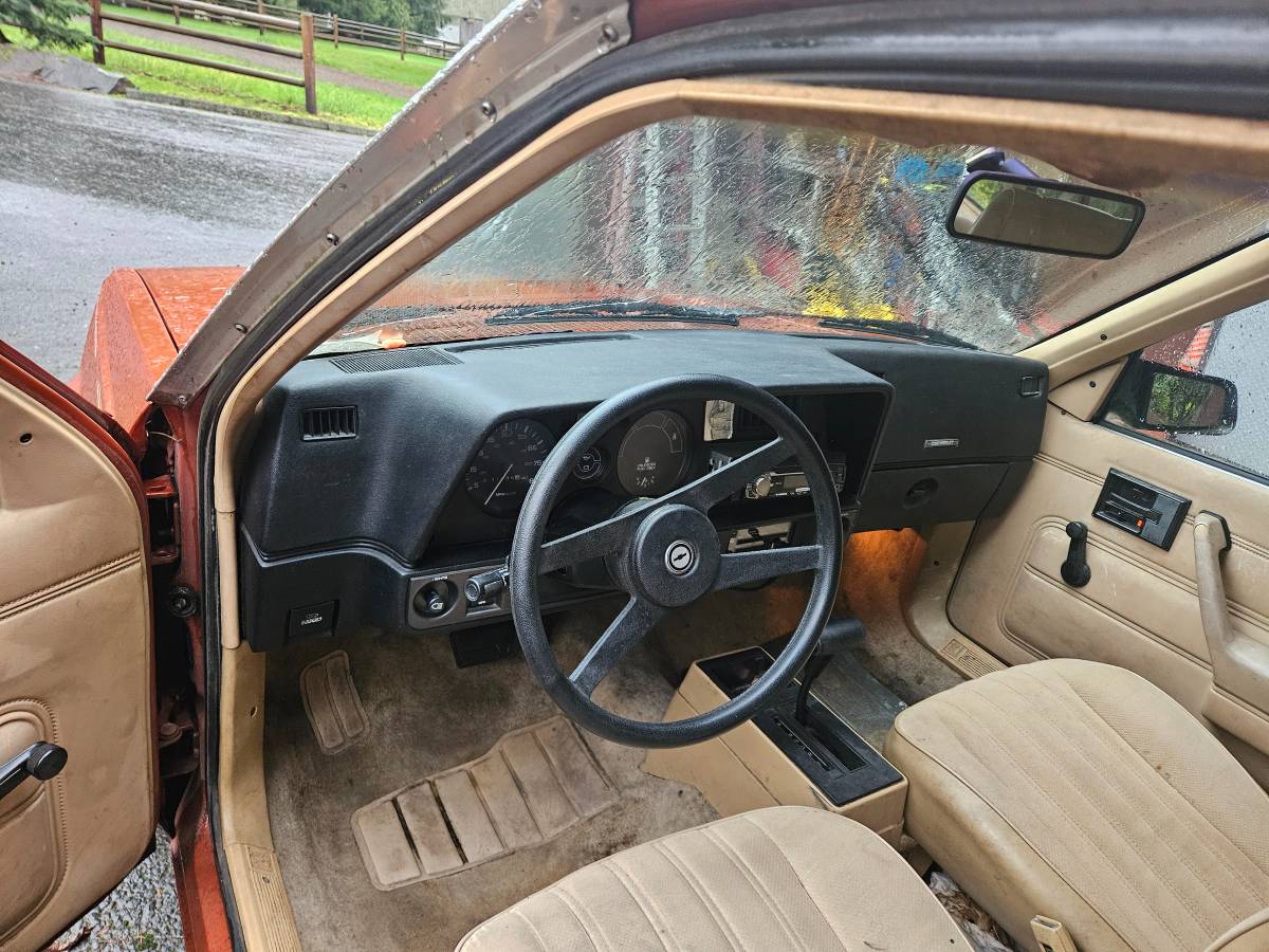 Chevy-cavalier-1985-orange-8