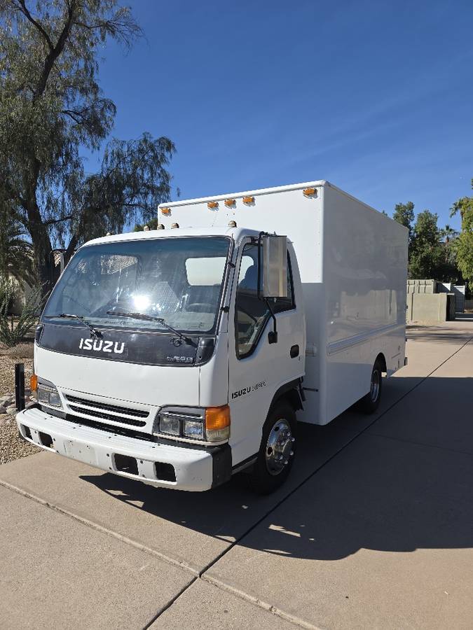 Isuzu-npr-truck-with-utility-bed-1995-white-1