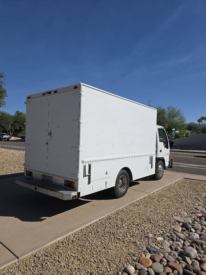 Isuzu-npr-truck-with-utility-bed-1995-white-3