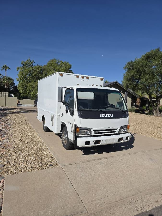 Isuzu-npr-truck-with-utility-bed-1995-white