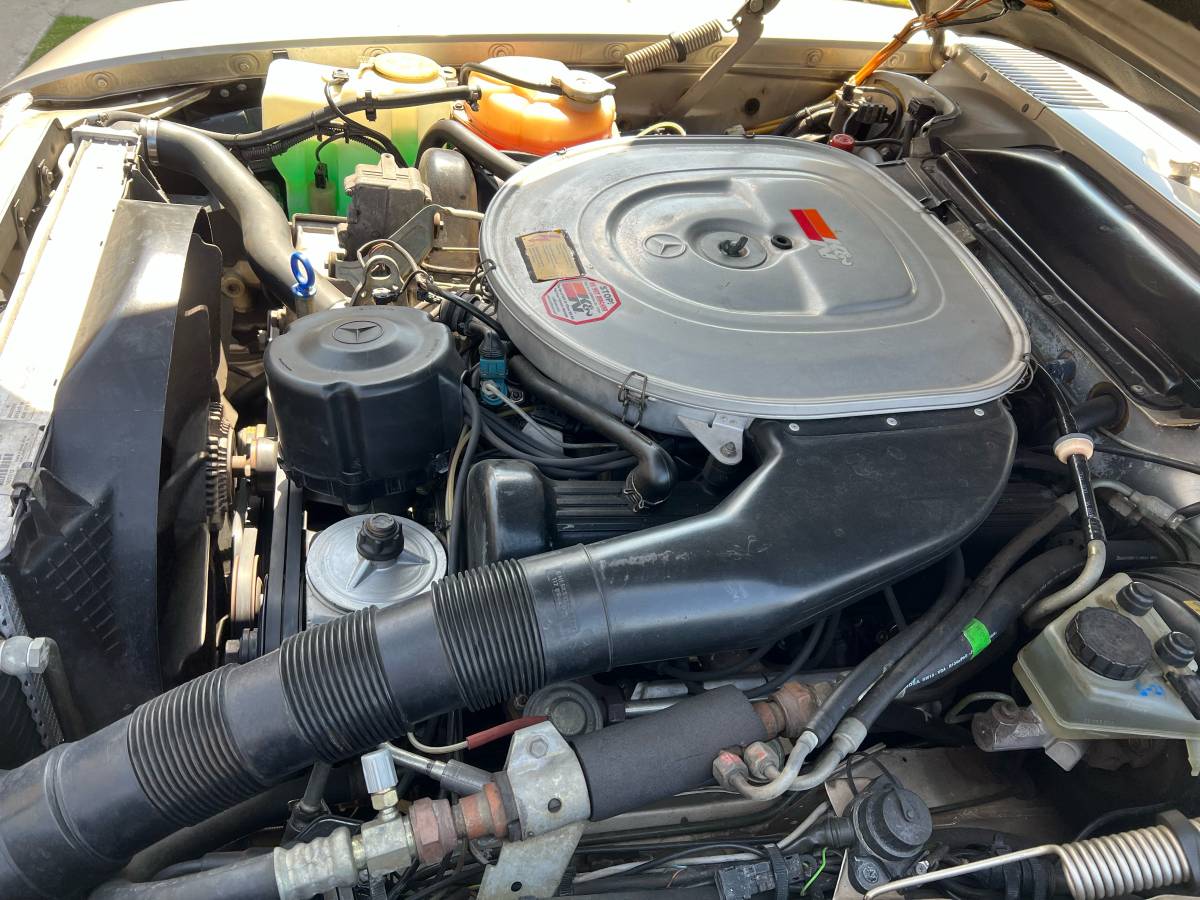 Mercedes-benz-560-1986-silver-4