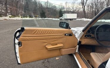 Mercedes-benz-560sl-roadster-1987-white-13