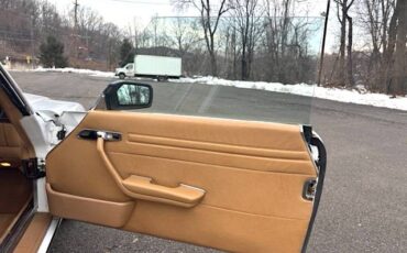 Mercedes-benz-560sl-roadster-1987-white-14