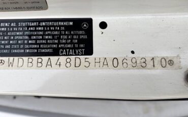 Mercedes-benz-560sl-roadster-1987-white-8