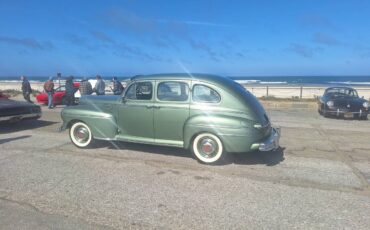 Mercury-monarch-4dr-sedan-1947-green-15