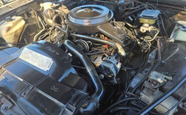 Olds-custom-cruiser-1989-white-3