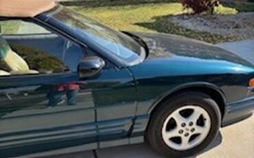 Oldsmobile-Cutlass-supreme-1995-Blue-Green-Metallic-Tan-1