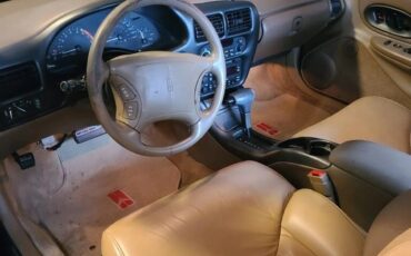 Oldsmobile-Cutlass-supreme-1995-Blue-Green-Metallic-Tan-11