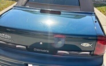 Oldsmobile-Cutlass-supreme-1995-Blue-Green-Metallic-Tan-15