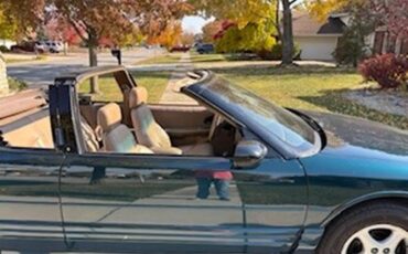 Oldsmobile-Cutlass-supreme-1995-Blue-Green-Metallic-Tan-17