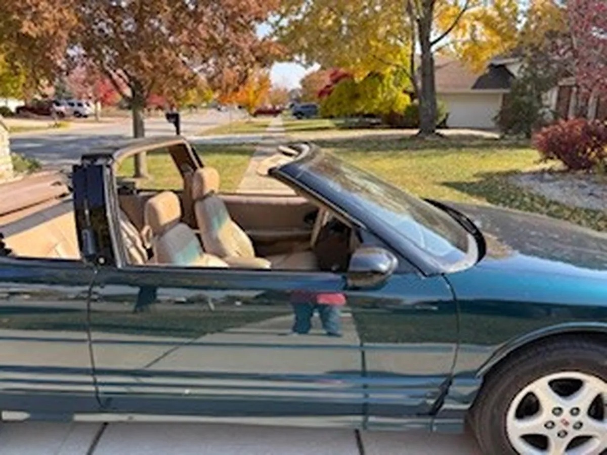 Oldsmobile-Cutlass-supreme-1995-Blue-Green-Metallic-Tan-17