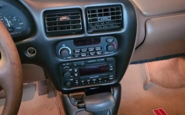 Oldsmobile-Cutlass-supreme-1995-Blue-Green-Metallic-Tan-18