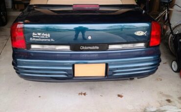 Oldsmobile-Cutlass-supreme-1995-Blue-Green-Metallic-Tan-4
