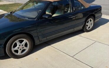 Oldsmobile-Cutlass-supreme-1995-Blue-Green-Metallic-Tan-5