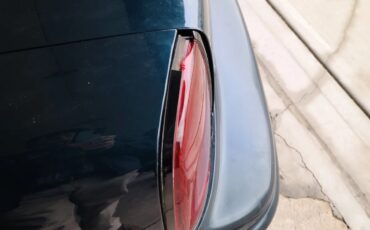 Oldsmobile-Cutlass-supreme-1995-Blue-Green-Metallic-Tan-9