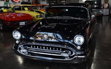 Oldsmobile-holiday-88-1955-black-23