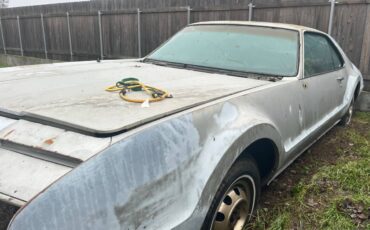 Oldsmobile-toronado-1966-silver-1