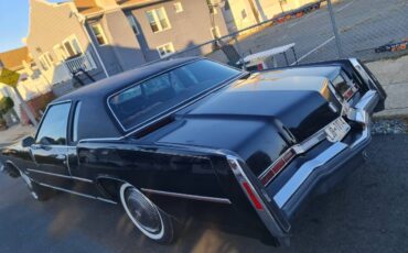 Oldsmobile-toronado-1976-black-3